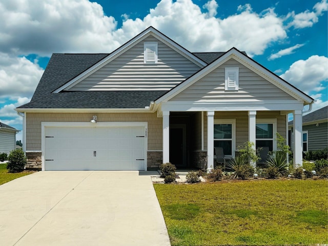3085 Sistine St, Myrtle Beach, SC 29579 - view of front of home with a porch, concrete driveway, a front lawn, a garage, and roof with shingles