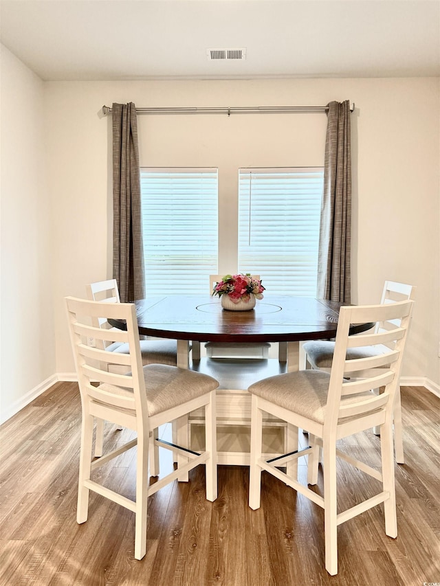 3085 Sistine St, Myrtle Beach, SC 29579 - dining space with wood finished floors and baseboards
