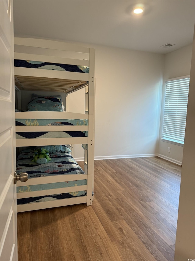 3085 Sistine St, Myrtle Beach, SC 29579 - unfurnished bedroom with wood finished floors and recessed lighting