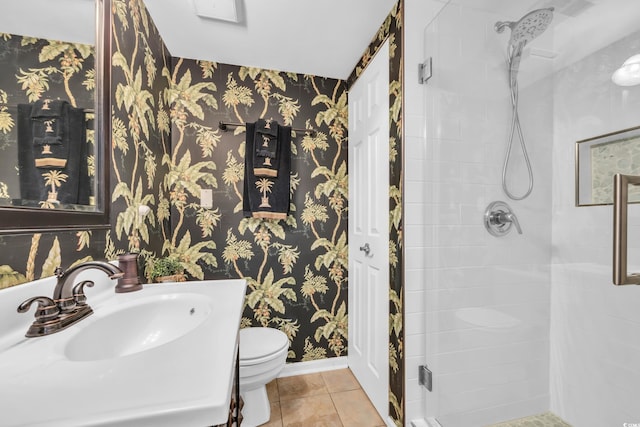 1500 Cenith Dr Unit E302, North Myrtle Beach, SC 29582 - bathroom featuring wallpapered walls, a stall shower, tile patterned flooring, and vanity