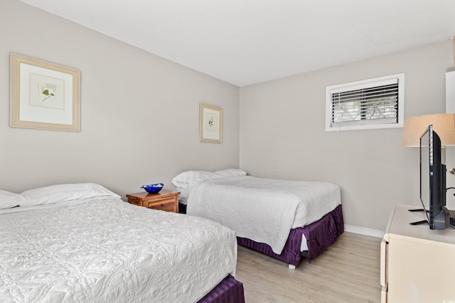 351 Lake Arrowhead Rd Unit 24-193, Myrtle Beach, SC 29572 - bedroom with light wood-style flooring and baseboards