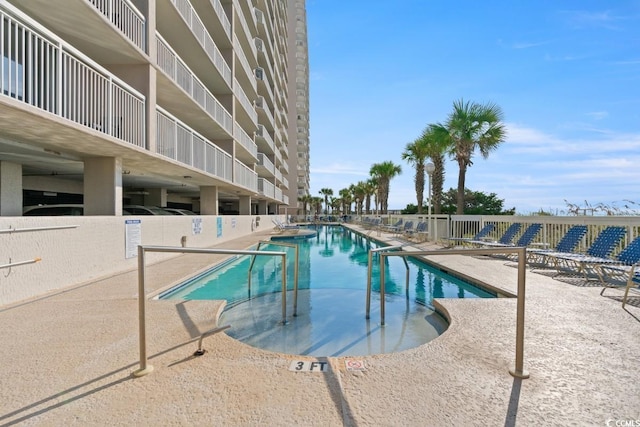 1625 S Ocean Blvd Unit 107, North Myrtle Beach, SC 29582 - community pool featuring a patio area