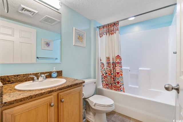1625 S Ocean Blvd Unit 107, North Myrtle Beach, SC 29582 - full bath featuring vanity, shower / bath combo with shower curtain, a textured ceiling, and tile patterned flooring