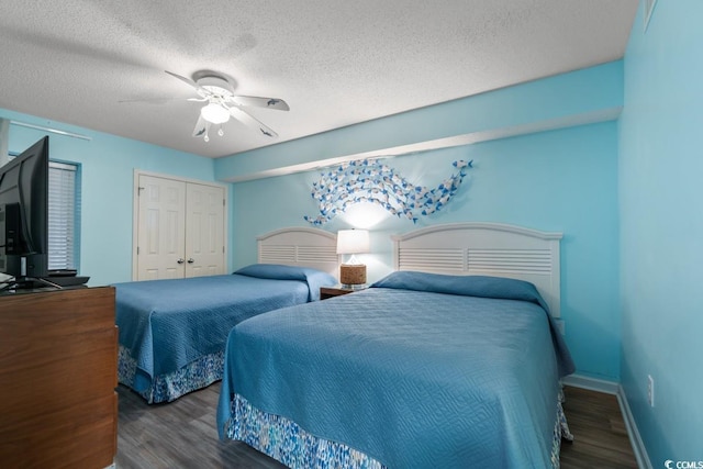 1625 S Ocean Blvd Unit 107, North Myrtle Beach, SC 29582 - bedroom featuring wood finished floors, a textured ceiling, a ceiling fan, and a closet
