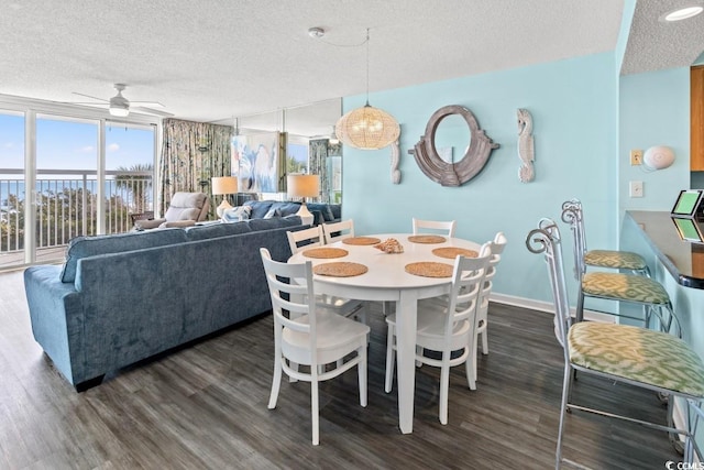 1625 S Ocean Blvd Unit 107, North Myrtle Beach, SC 29582 - dining space featuring ceiling fan, a textured ceiling, wood finished floors, and healthy amount of natural light