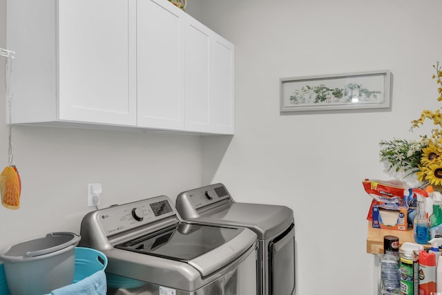 2766 Stellar Loop, Myrtle Beach, SC 29577 - laundry room featuring washing machine and clothes dryer and cabinet space