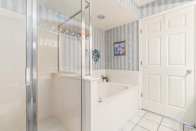 102 N Ocean Blvd Unit 508, North Myrtle Beach, SC 29582 - full bathroom with wallpapered walls, a garden tub, tile patterned flooring, and a stall shower