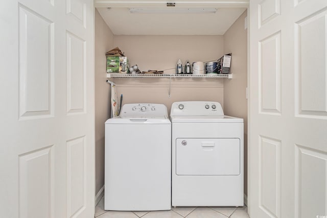 102 N Ocean Blvd Unit 508, North Myrtle Beach, SC 29582 - laundry area with separate washer and dryer and light tile patterned flooring