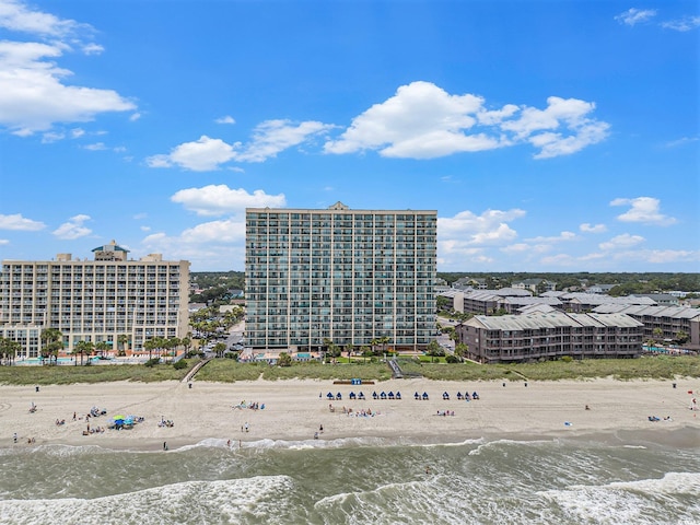 102 N Ocean Blvd Unit 508, North Myrtle Beach, SC 29582 - view of building exterior with view of water and beach
