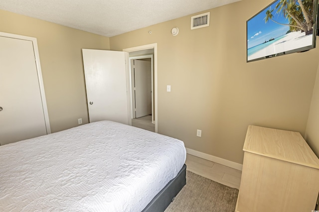 2000 N Ocean Blvd Unit 1117, Myrtle Beach, SC 29577 - tiled bedroom featuring baseboards