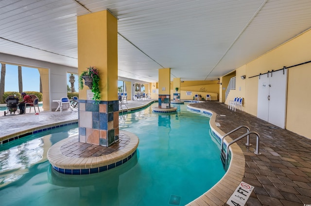2000 N Ocean Blvd Unit 1117, Myrtle Beach, SC 29577 - indoor pool with a patio area