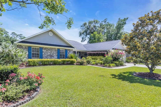 209 Chickasaw Ln, Myrtle Beach, SC 29579 - ranch-style house with a front lawn and brick siding