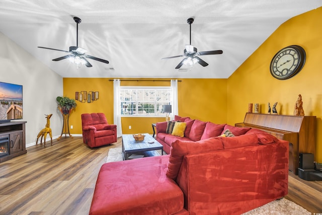 209 Chickasaw Ln, Myrtle Beach, SC 29579 - living room featuring vaulted ceiling, ceiling fan, and wood finished floors
