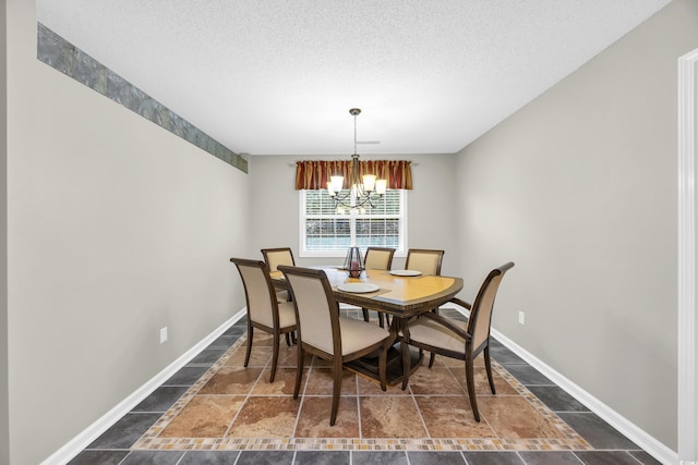 209 Chickasaw Ln, Myrtle Beach, SC 29579 - dining area with a chandelier, stone tile flooring, and a textured ceiling