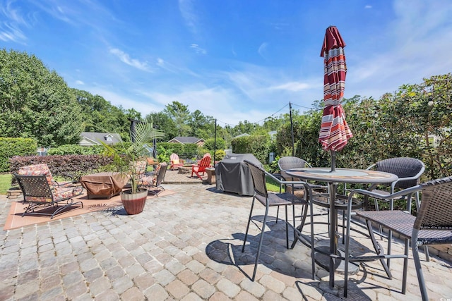 209 Chickasaw Ln, Myrtle Beach, SC 29579 - view of patio featuring grilling area and outdoor dining space