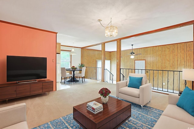 3916 Quail Cir, Myrtle Beach, SC 29579 - living room with a chandelier, wooden walls, and carpet floors