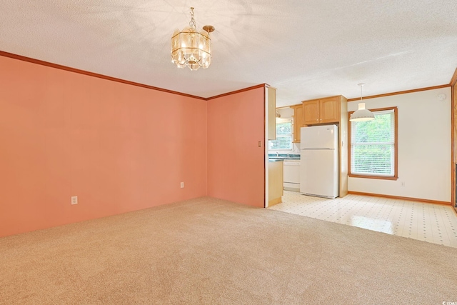 3916 Quail Cir, Myrtle Beach, SC 29579 - unfurnished room with light colored carpet, ornamental molding, a chandelier, and a textured ceiling