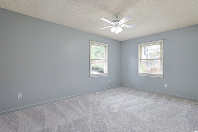 3916 Quail Cir, Myrtle Beach, SC 29579 - unfurnished room with a textured ceiling, carpet floors, and ceiling fan