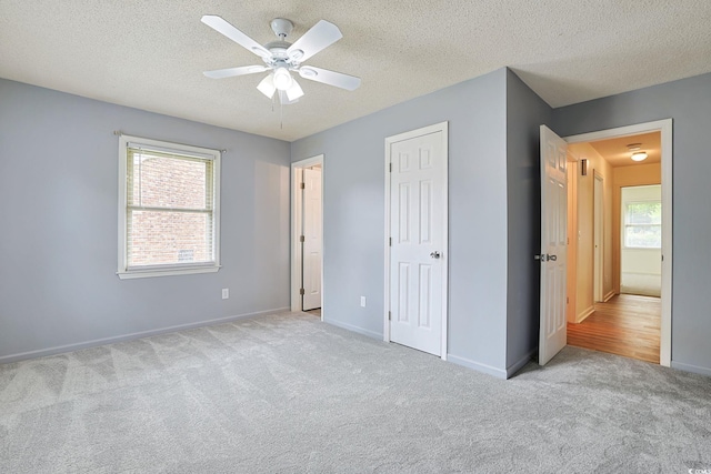 3916 Quail Cir, Myrtle Beach, SC 29579 - unfurnished bedroom with carpet flooring, a textured ceiling, and ceiling fan