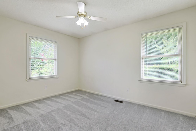 3916 Quail Cir, Myrtle Beach, SC 29579 - unfurnished room featuring light carpet and ceiling fan
