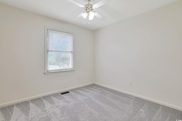 3916 Quail Cir, Myrtle Beach, SC 29579 - carpeted empty room with ceiling fan and a textured ceiling