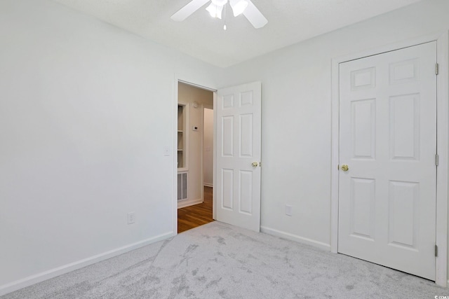 3916 Quail Cir, Myrtle Beach, SC 29579 - unfurnished bedroom with carpet and a ceiling fan