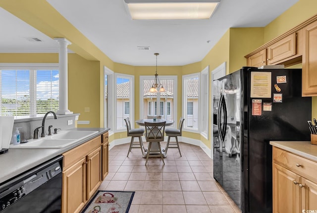 2180 Waterview Dr Unit 647, North Myrtle Beach, SC 29582 - kitchen with black appliances, light brown cabinetry, light tile patterned floors, and decorative columns