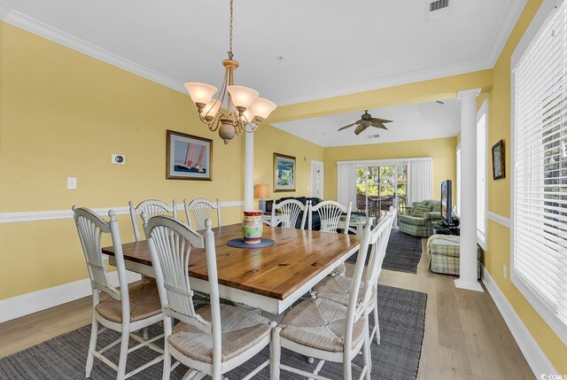 2180 Waterview Dr Unit 647, North Myrtle Beach, SC 29582 - dining room with ornate columns, light wood-style floors, ceiling fan, a chandelier, and ornamental molding