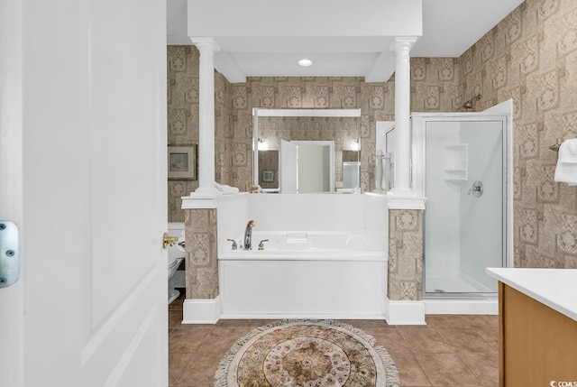 2180 Waterview Dr Unit 647, North Myrtle Beach, SC 29582 - bathroom featuring ornate columns, a garden tub, a stall shower, vanity, and tile patterned flooring
