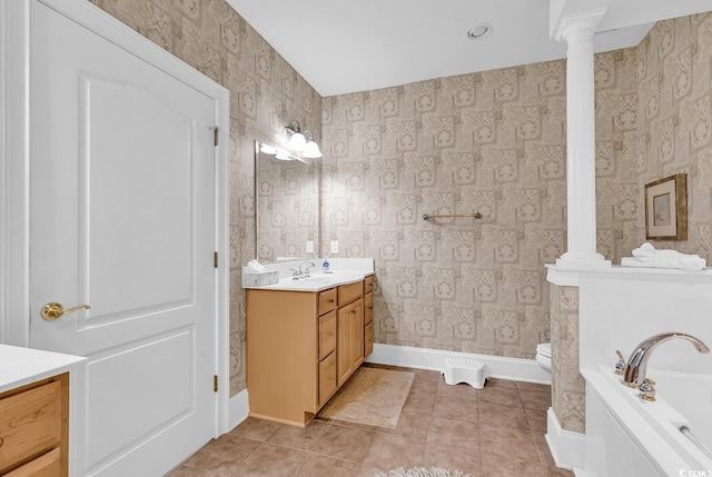2180 Waterview Dr Unit 647, North Myrtle Beach, SC 29582 - full bath featuring vanity, a bath, wallpapered walls, ornate columns, and tile patterned flooring