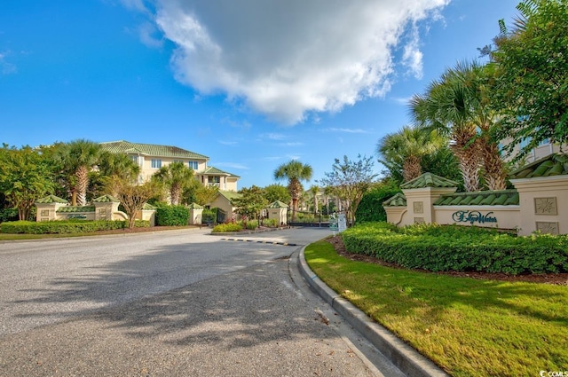 2180 Waterview Dr Unit 647, North Myrtle Beach, SC 29582 - view of asphalt road featuring curbs, a gated entry, and a gate