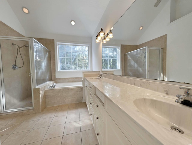 25 Deloach Trl, Pawleys Island, SC 29585 - full bathroom with lofted ceiling, a bath, tile patterned floors, double vanity, and a shower stall