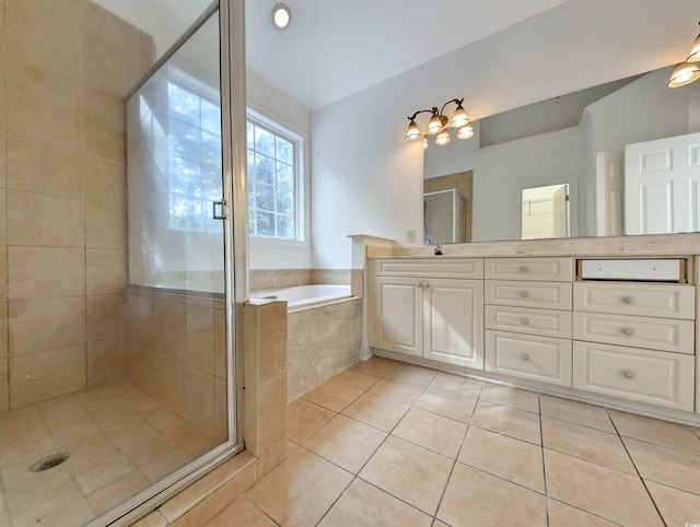25 Deloach Trl, Pawleys Island, SC 29585 - full bath featuring tile patterned floors, a garden tub, vanity, and a stall shower