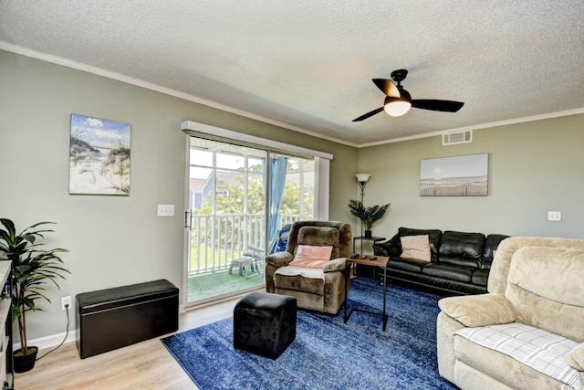 2187 Clearwater Dr Unit H, Surfside Beach, SC 29575 - living room with wood finished floors, ceiling fan, a textured ceiling, and ornamental molding