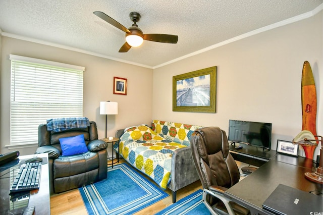 2187 Clearwater Dr Unit H, Surfside Beach, SC 29575 - bedroom featuring wood finished floors, crown molding, a textured ceiling, an office area, and a ceiling fan