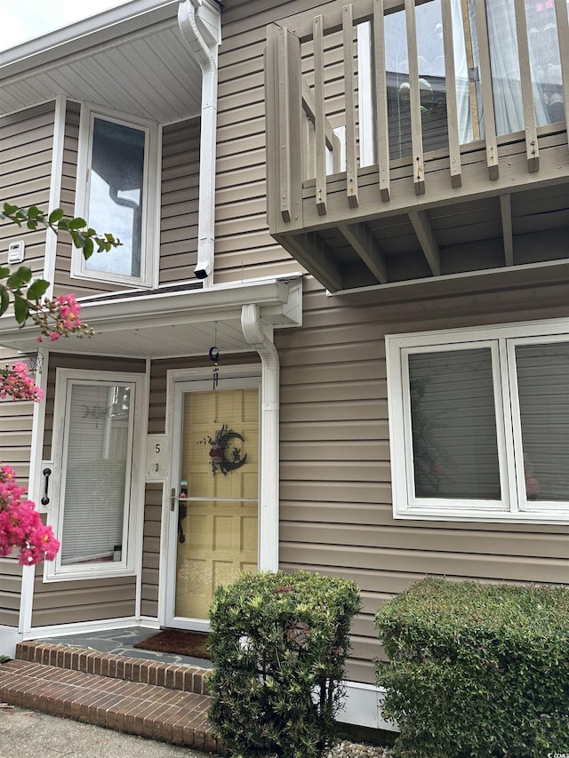 405 77th Ave N Unit 5, Myrtle Beach, SC 29572 - view of exterior entry with a balcony