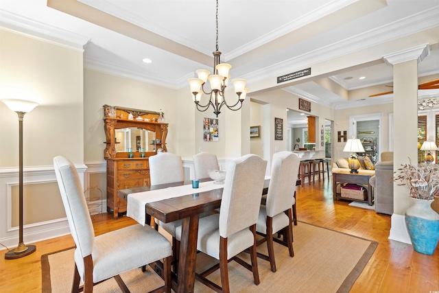 60 Springtime Ct, Murrells Inlet, SC 29576 - dining room featuring ornamental molding, light wood-style flooring, a raised ceiling, a chandelier, and recessed lighting
