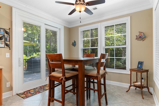 60 Springtime Ct, Murrells Inlet, SC 29576 - dining space with healthy amount of natural light, crown molding, light tile patterned floors, and ceiling fan
