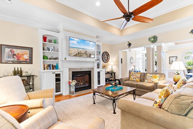 60 Springtime Ct, Murrells Inlet, SC 29576 - living room with crown molding, ceiling fan, ornate columns, a fireplace with flush hearth, and wood finished floors