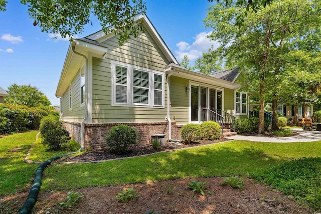 60 Springtime Ct, Murrells Inlet, SC 29576 - view of front of home with brick siding and a front lawn