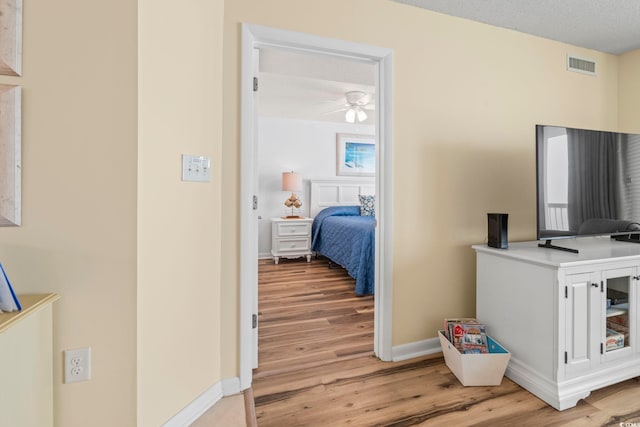 5310 N Ocean Blvd Unit 7C, North Myrtle Beach, SC 29582 - hallway with light wood-type flooring and baseboards