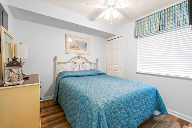 5310 N Ocean Blvd Unit 7C, North Myrtle Beach, SC 29582 - bedroom with wood finished floors, ceiling fan, and a textured ceiling