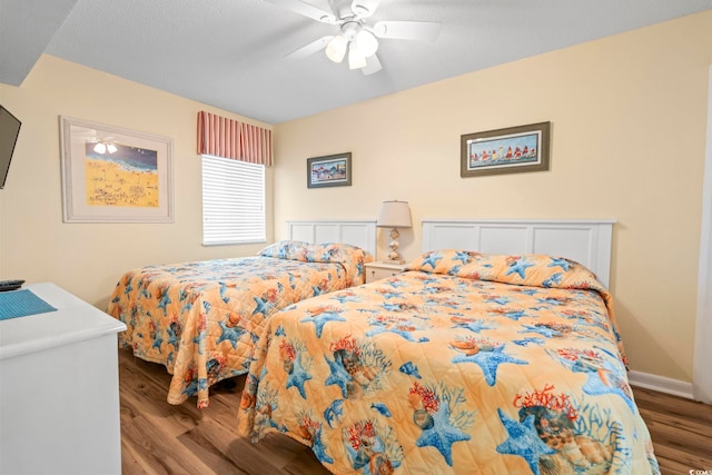5310 N Ocean Blvd Unit 7C, North Myrtle Beach, SC 29582 - bedroom featuring wood finished floors and ceiling fan