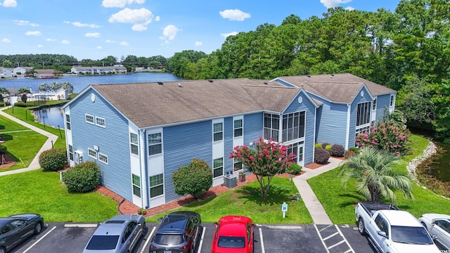 2122 Clearwater Dr Unit C, Surfside Beach, SC 29575 - exterior space featuring uncovered parking and a water view