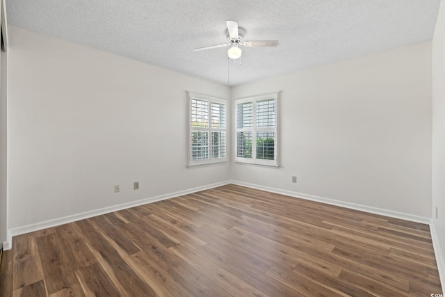 2122 Clearwater Dr Unit C, Surfside Beach, SC 29575 - unfurnished room featuring ceiling fan, a textured ceiling, and wood finished floors