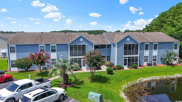 2122 Clearwater Dr Unit C, Surfside Beach, SC 29575 - view of building exterior with uncovered parking
