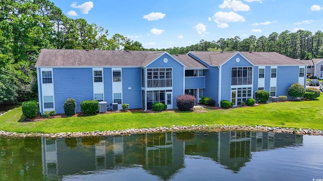 2122 Clearwater Dr Unit C, Surfside Beach, SC 29575 - back of house with a lawn and a water view
