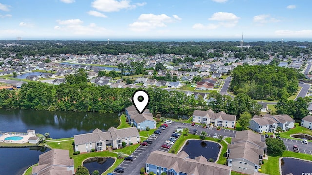 2122 Clearwater Dr Unit C, Surfside Beach, SC 29575 - aerial view of property and surrounding area featuring a large body of water and nearby suburban area