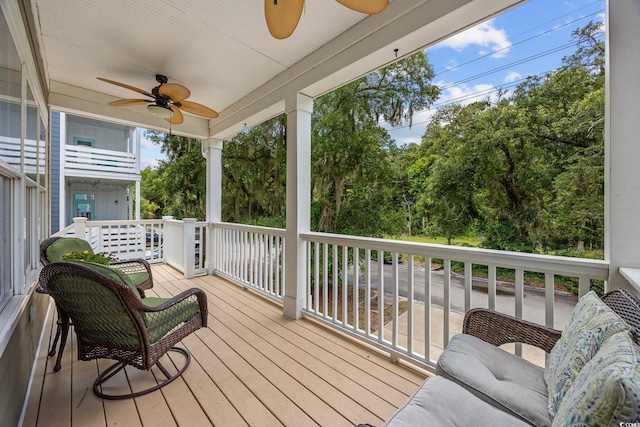 43 Sandlapper Way, Pawleys Island, SC 29585 - wooden terrace featuring a ceiling fan and outdoor lounge area
