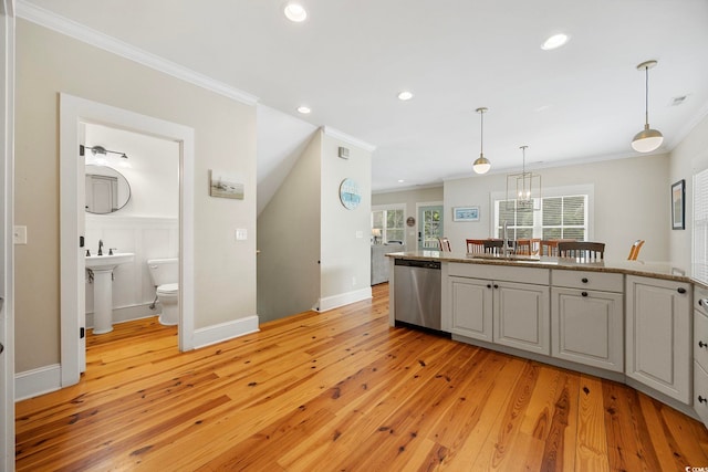 43 Sandlapper Way, Pawleys Island, SC 29585 - kitchen with dishwasher, crown molding, light wood-style flooring, recessed lighting, and hanging light fixtures